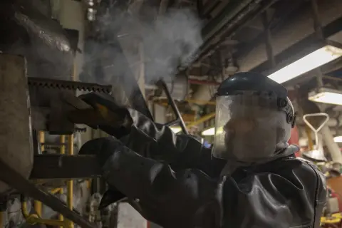 Engineer working on boiler equipment